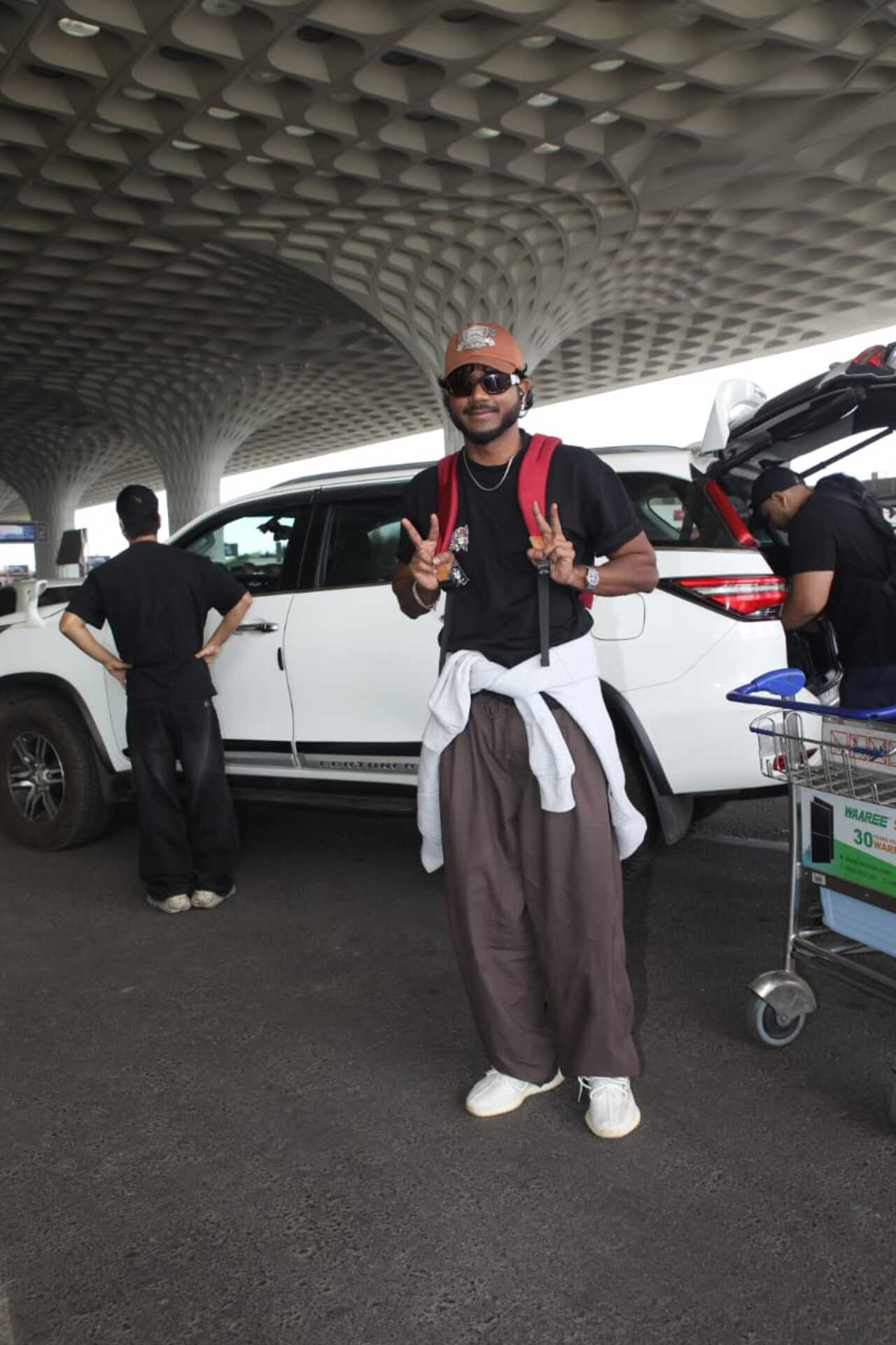 <p>Singer and rapper King was also papped at the airport as he headed out of the city.</p>